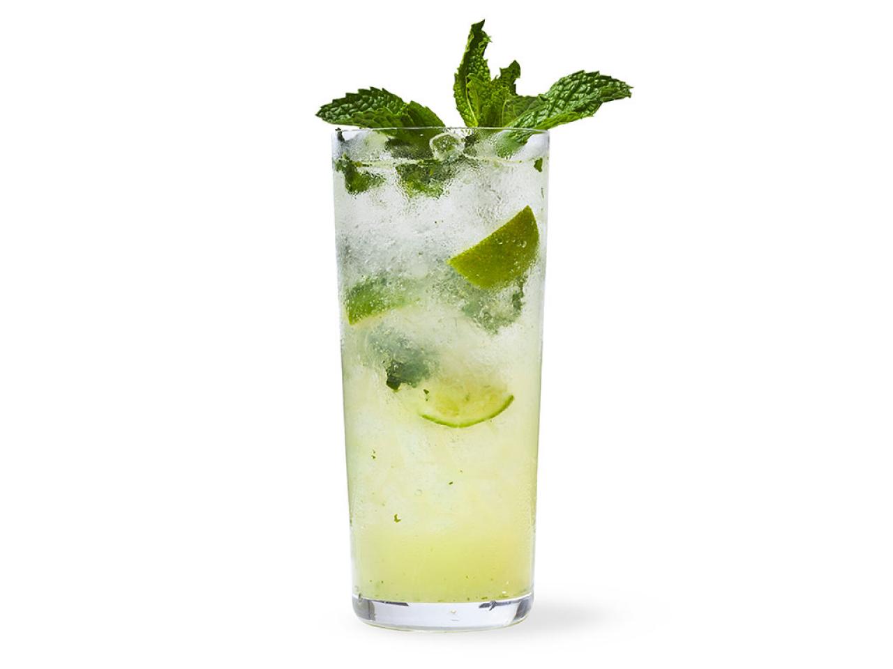 Mojito cocktail with lime and mint in highball glass on a grey stone  background Stock Photo by annapustynnikova