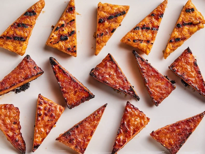 Description: Food Network Kitchen's The Best Tempeh Marinade. Keywords: Honey, Agave, Sriracha, Rice Vinegar, Garlic Powder, Onion Powder, Smoked Paprika, Tempeh.
