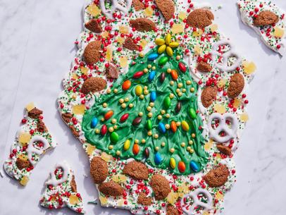 Description: Food Network Kitchen's Break Apart Christmas Tree Bark. Keywords: Candy Melting Wafers, Gingerbread Cookies, Gingersnaps, Yogurt Covered Pretzels, Candied Ginger, M&Ms, Sprinkles.
