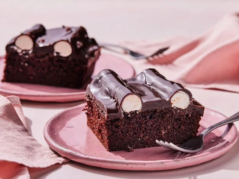 Description: Food Network Kitchen's Bumpy Cake. Keywords: Milk, Vanilla Extract, Cocoa Powder, Eggs, Flour, Sugar, Instant Espresso Powder, Buttermilk.