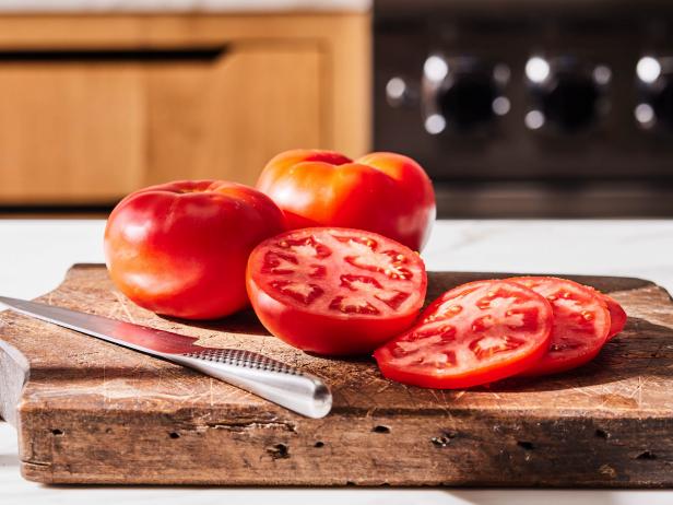 Headline: A CONCISE GUIDE TO THE DIFFERENT TYPES OF TOMATOES Description: Food Network Kitchen's A CONCISE GUIDE TO THE DIFFERENT TYPES OF TOMATOES. Keywords: Tomatoes