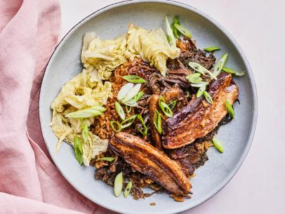 Description: Food Network Kitchen's Rice Cooker Pork Belly with Mu Choy and Jasmine Rice. Keywords: Mu Choy, Pork Belly, Jasmine Rice, Ginger, Star Anise, Soy Sauce, Garlic, Chicken Broth, Shaoxing Wine, Cabbage.
