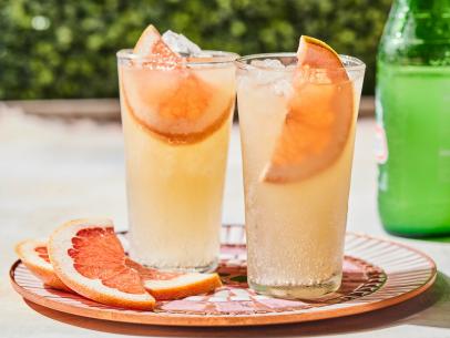 Description: Geoffrey Zakarian's Paloma. Keywords: Tequila Blanco, Grapefruit, Orange Juice, Lime Juice, Grapefruit Soda.