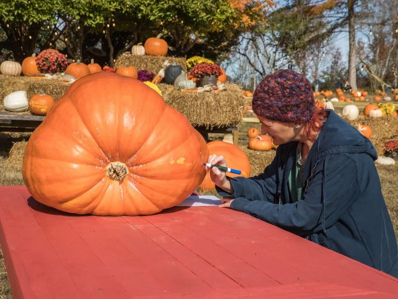 Leigh Henderson works on her carve, as seen on Outrageous Pumpkins, Season 3.