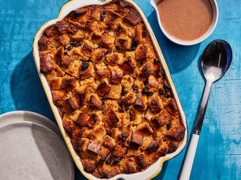 Description: Kardea Brown's Not Your Grandma’s Bread Pudding. Keywords: Eggs, Raisins, Cinnamon, Ginger, Sugar, French Bread, Bourbon, Milk.
