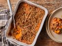 Description: Kardea Brown's Sweet Potato Pie-Stuffed Cornbread. Keywords: Sweet Potato, Orange Juice, Cinnamon, Nutmeg, Vanilla Extract, Egg, Cornmeal, Buttermilk.