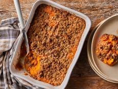 Complete your Thanksgiving spread with Trisha Yearwood's classic Southern Sweet Potato Souffle recipe from Food Network.