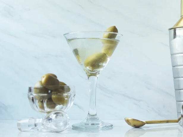Dirty martini ingredients and objects. Copy space.