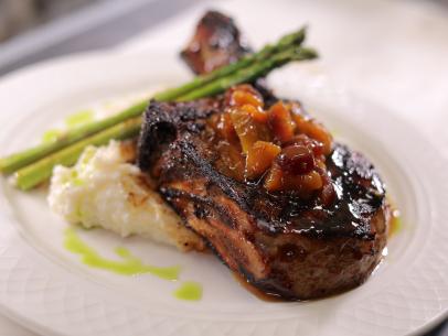 The Bourbon BBQ Porkchop as served at Rose Villa Southern Table in Ormond Beach, Florida, as seen on Food Network's Diners, Drive-Ins and Dives, season 36.