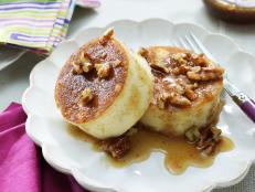 Thanks to metal ring molds and egg whites, these pancakes stand tall and are super fluffy. Top them with my homemade butter pecan syrup, and you've got yourself a winning breakfast&mdash;or dinner!