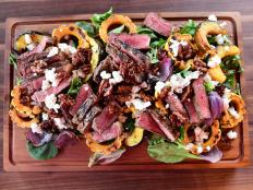 Ree thinks strip steak is great for salad. There&rsquo;s not too much fat, but there is some nice marbling throughout. Ree and her family love to use lemon pepper to season their steaks before cooking for the extra flavor it imparts.