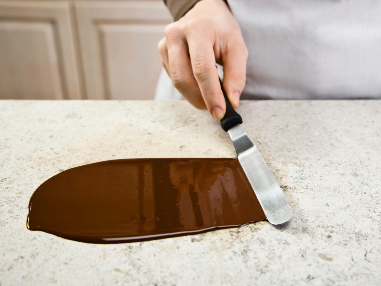 You don't need a thermometer to temper chocolate! I don't know when th