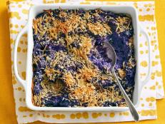 The color of the potatoes takes center stage, while the light crunch of the panko is a great costar. Purple potatoes are notoriously flaky and less starchy, so the butter, cream and cheese help smooth things out.
