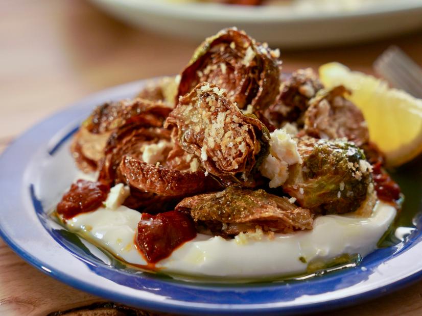 Beauty shot of Molly Yeh's Fried Brussels Sprouts with Feta, Lemon and Breadcrumbs as seen on Girl Meets Farm, Season 11.