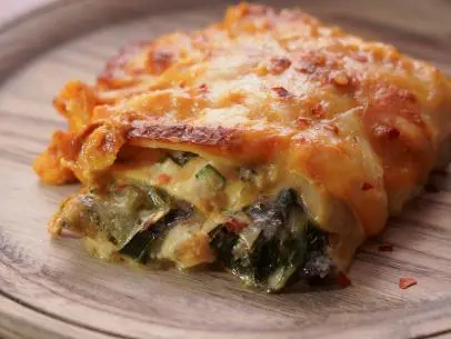 Beauty shot of Molly Yeh's Pumpkin, Bacon & Chard Lasagna as seen on Girl Meets Farm, Season 11.
