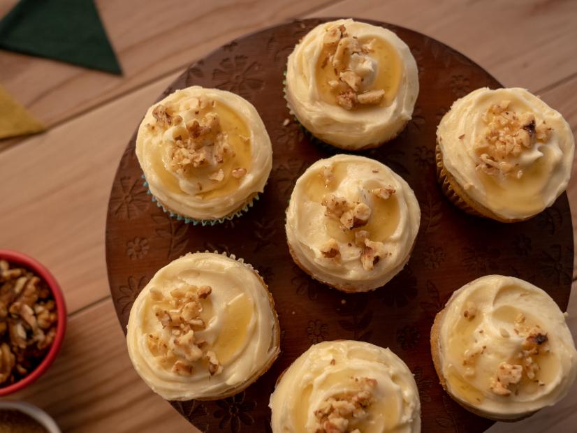 Beauty shot of Molly Yeh's Honey Cupcakes with Salted Honey Frosting as seen on Girl Meets Farm, Season 11.