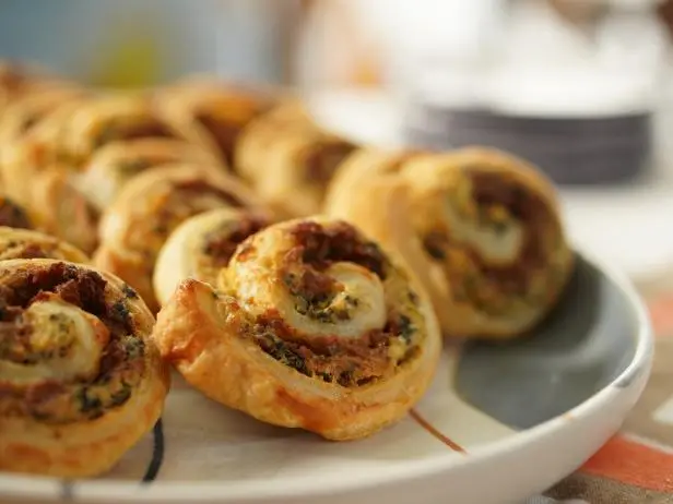 Spinach, Artichoke and Sausage Pinwheels Recipe | Jeff Mauro