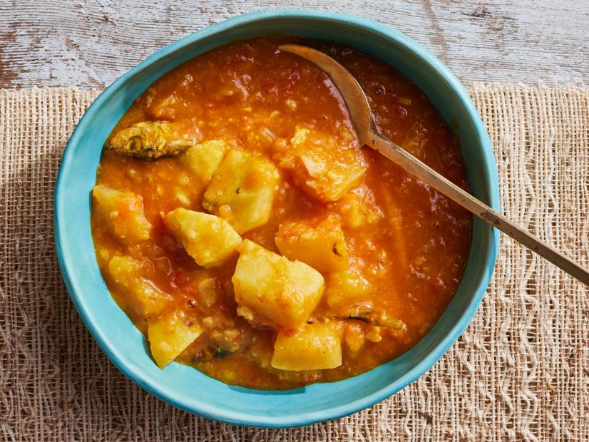 Description: Food Network Kitchen's Asaro (Yam Porridge). Keywords: Bell Peppers, Tomatoes, Onion, Garlic, Habanero, Zomi Red Palm Oil, Ground Crayfish, Dried Herring, West African Yam, Japanese Sweet Potatoes