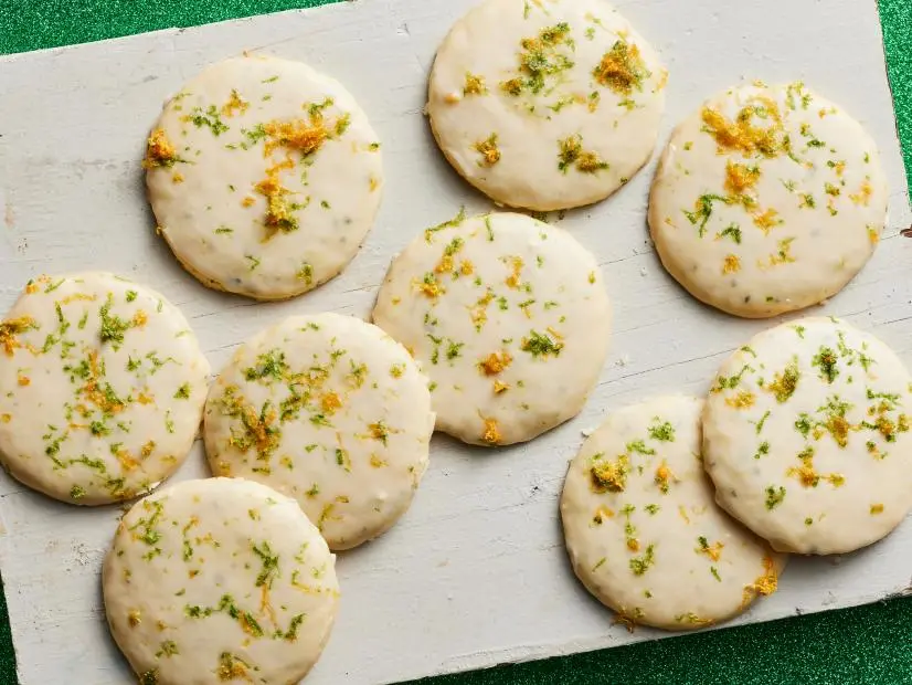 Description: Food Network Kitchen's Mojito Sugar Cookies. Keywords: Sugar, Mint, Vanilla Extract, Egg, Lime, Confectioners’ Sugar, Aged Rum, Pink Grapefruit