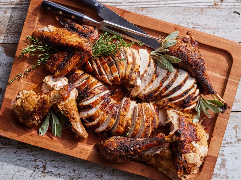 Description: Food Network Kitchen's Smoked Turkey. Keywords: Turkey, Paprika, Brown Sugar, Thyme, Cayenne Pepper, Onion, Garlic, Sage