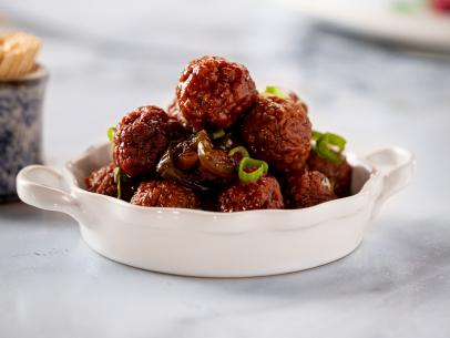 Close-up of Spicy Grape Jelly Meatballs, as seen on The Pioneer Woman, season 32.