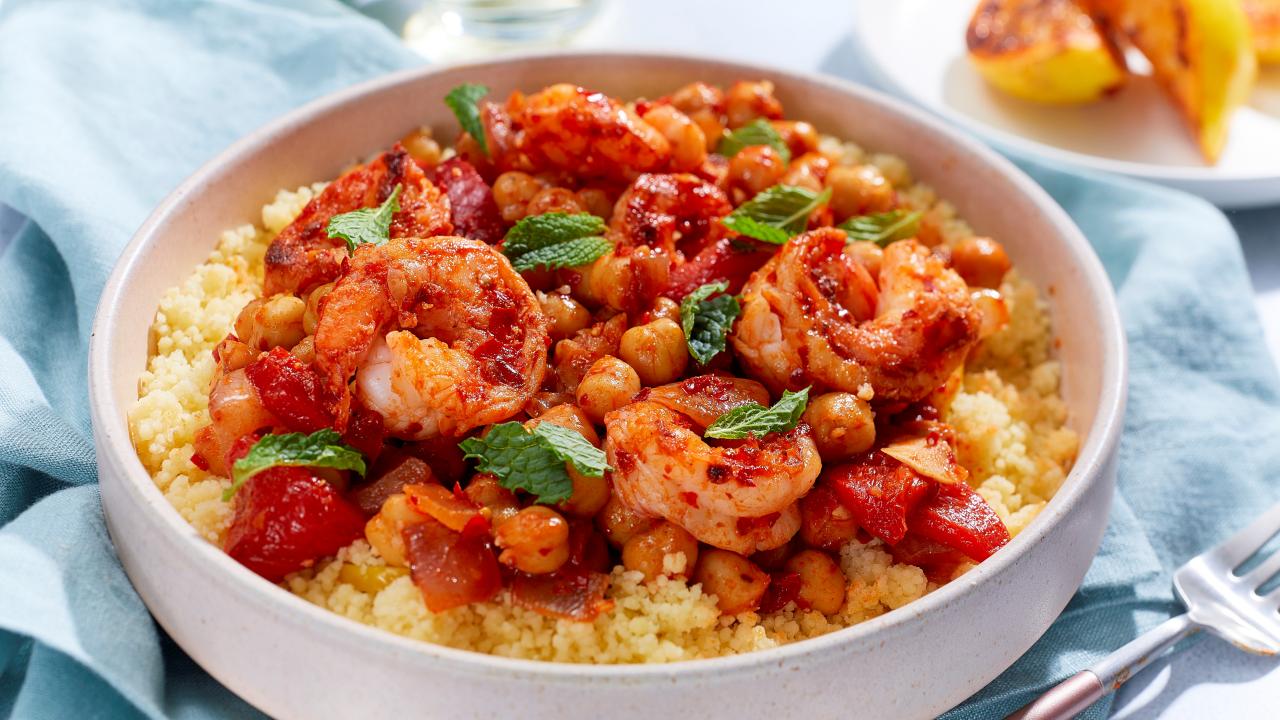 https://food.fnr.sndimg.com/content/dam/images/food/fullset/2022/11/22/FPLF122-mary-berg-harissa-shrimp-chickpeas_s4x3.jpg.rend.hgtvcom.1280.720.suffix/1669133824472.jpeg