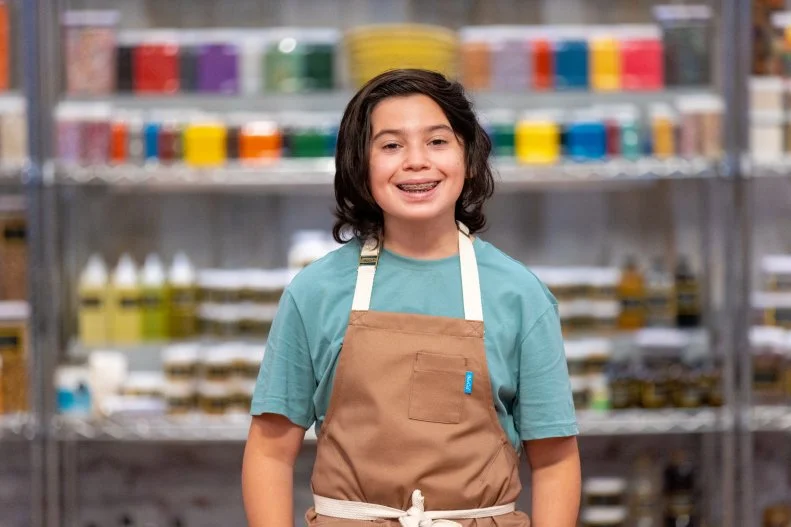 Contestant Logan, portrait, as seen on Kids Baking Championship, Season 11.