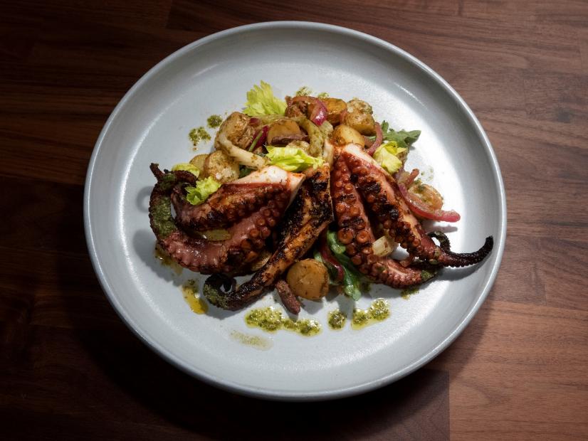 Anne Burrell’s Grilled Octopus and Warm Potato Salad with Smoked Paprika and Capers is displayed, as seen on Worst Cooks in America, Season 25.