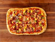 Store-bought, refrigerated dough guarantees there&rsquo;s a pizza on the dinner table in under half an hour. Ree tops this one with fresh pineapple and jalape&ntilde;os, but canned or jarred work just as well. Alongside the bacon, this combination packs a real flavor punch.