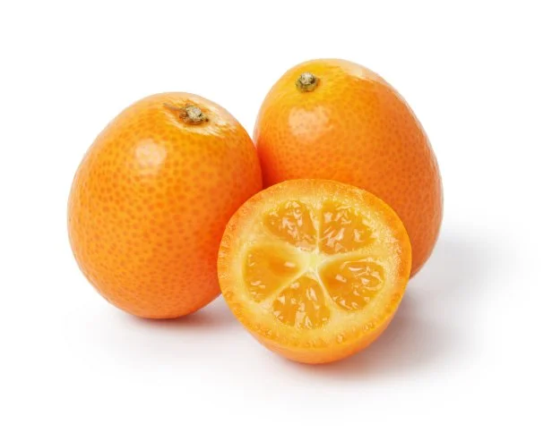ripe kumquat fruits, isolated on white background