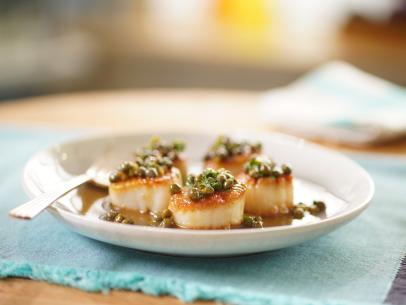 Alex Guarnaschelli's Seared Scallops with a Quick Lemony Pan Sauce Beauty, as seen on The Kitchen, Season 33.