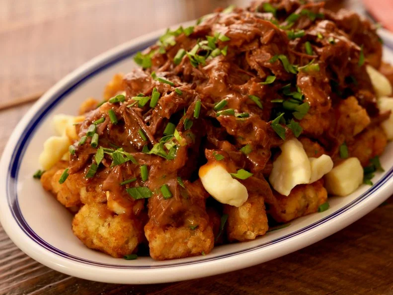Beauty shot of Molly Yeh's Hot Tot Short Rib Poutine, as seen on Girl Meets Farm Season 12.