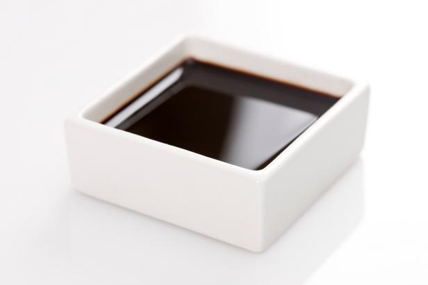 soy sauce in square bowl.