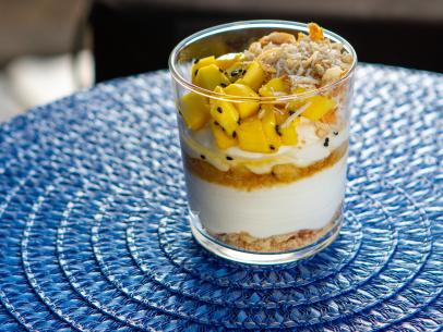 Brooke Williamson’s Whipped Coconut Cheesecake with Marinated Mango, as seen on Guy's Ranch Kitchen, season 6.