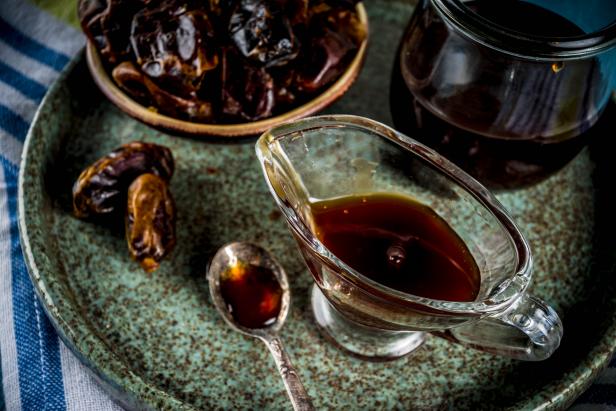 Date honey with dried dates, Jewish national sweet food, copy space