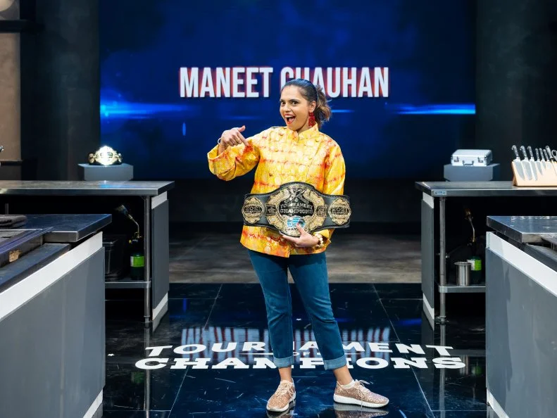 Contestant Maneet Chauhan with the 2021 Tournament of Champions Belt, as seen on Tournament of Champions, Season 4.