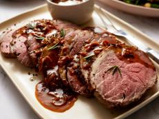 Peppery roast beef served with gravy made with onions, rosemary and white wine.