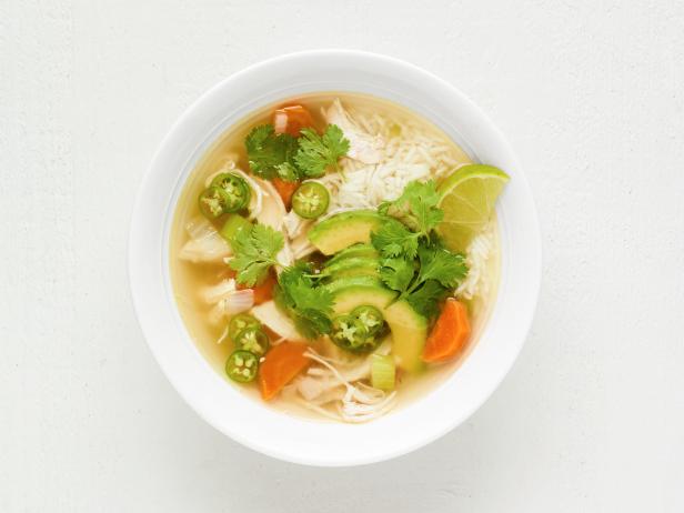 https://food.fnr.sndimg.com/content/dam/images/food/fullset/2023/11/09/FNM120123_chicken-soup-with-rice-and-avocado_s4x3.jpg.rend.hgtvcom.616.462.suffix/1699565705512.jpeg