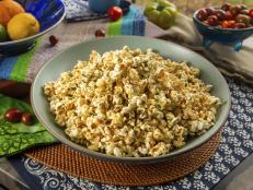 This recipe uses ghee to pop the popcorn. Since most of the water has been removed from the butter when it was clarified, this will ensure that the popcorn will stay nice and crispy. And of course, it&rsquo;s all about black pepper, Parmesan and pecorino!