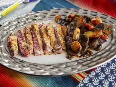 Aaron May’s Parmesan Habanero Crusted Ribeye and his Peri Peri Potatoes, as seen on GRK.