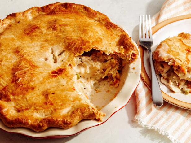 Premium Photo  Homemade hearty kurnik pie with chicken potatoes and rice  on parchment vertical view