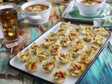 Crab rangoon is one of my favorite appetizers to order when I go to a Chinese restaurant, so I decided to make an inspired version at home. In addition to more crabmeat, I've also added white Cheddar and roasted red peppers. These are so good &mdash; I bet you can't eat just one!