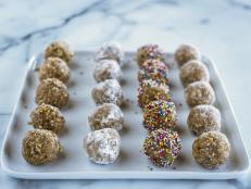 These sweet treats are perfect to serve at a party. The soft centers are rolled in a selection of coatings: chopped pecans, sanding sugar, powdered sugar and nonpareils, giving a range of delicious textures, and guaranteeing that there will be no leftovers!
