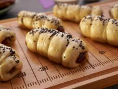 Molly and Nick throw a Super Bowl party every year just so she can have an excuse to make her favorite food: pigs in a blanket. She&rsquo;s made a million variations, but this steamed bun lap cheong version might be her fave since it mimics the innards of fluffy white bread without the crust and the sweet Chinese sausage fat soaks into the dough&hellip;they&rsquo;re so good.