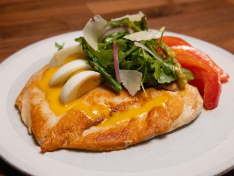 Chicken Paillard with Asparagus, Shaved Parm, Hard Boiled Egg and Arugula Salad with Tomato Lemon Vinaigrette
