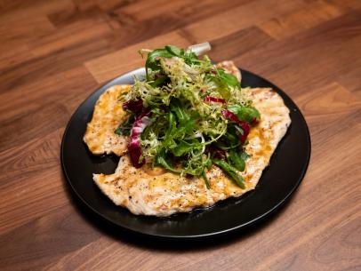 Co-Host Tiffany Derrys main dish Chicken Paillard with Frisee Salad, as seen on Worst Cooks in America, Season 27, Spoiled Rotten