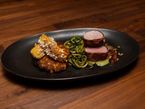 Prosciutto Wrapped Pork Tenderloin, Corn Pancakes with Zucchini Noodles and Corn Ribs with Salsa Verde