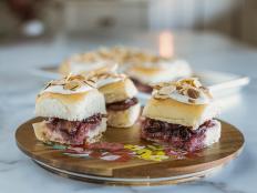 Using a pack of store-bought rolls as a shortcut, Ree has devised a sweet dish that she describes as being almost like glazed cherry filled donuts. You could make this a savory dish too with a layer of scrambled eggs, bacon and cheese to replace the cherry mixture.