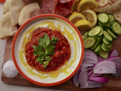 Beauty Shot of Molly Yeh's Matbucha - Cooked Feta, Tomato + Roasted Pepper Salad, as seen on Girl Meets Farm Season 14