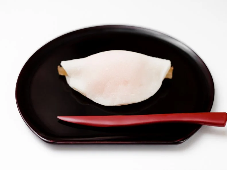 Hanabira-mochi is Japanese confection it literally means "flower petal rice cake"it is sweet eaten at  beginning of year.